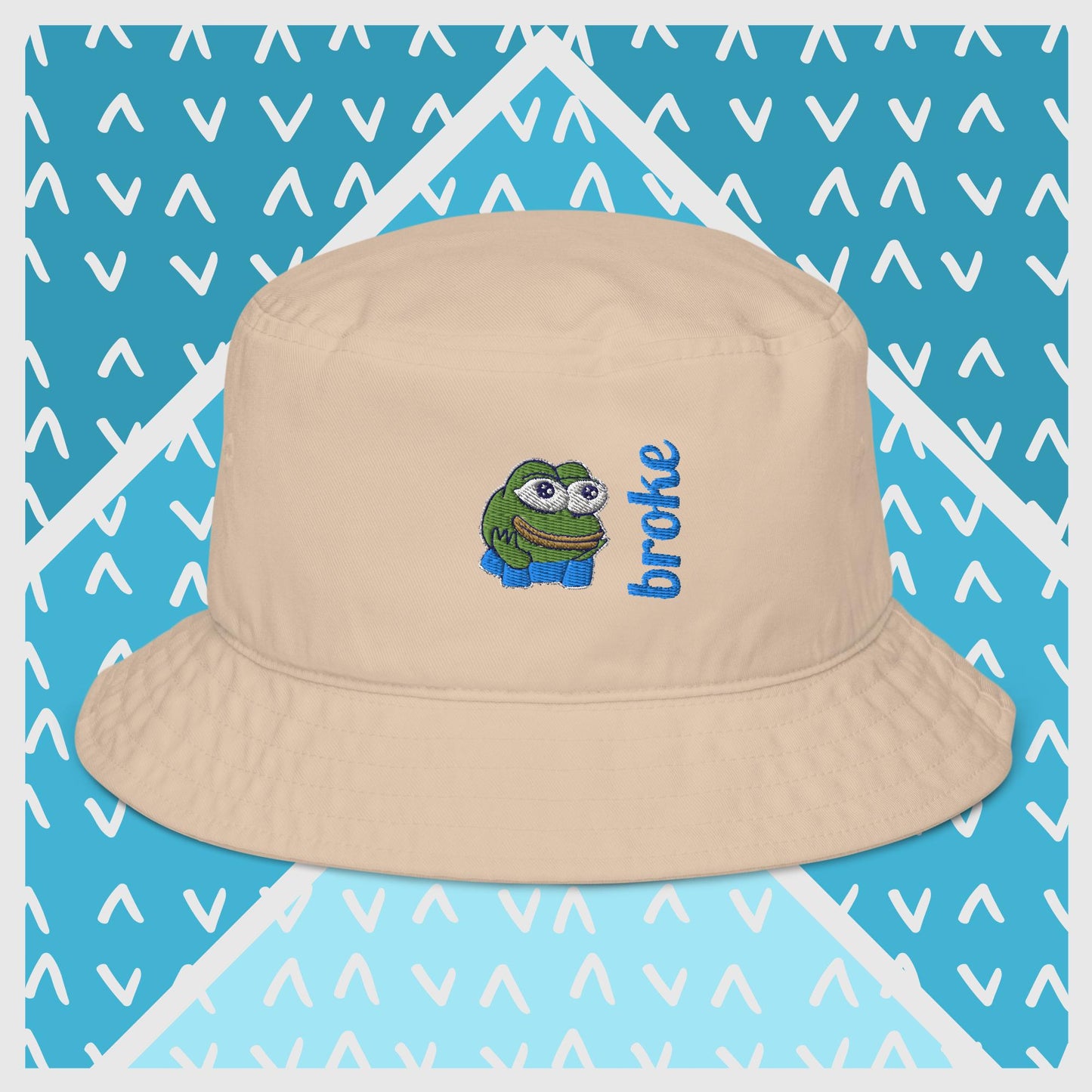 Pepe the Frog bucket hat in green with high-quality embroidery of Pepe wearing blue pants, paired with the word 'broke' in bold blue stitching. Trendy streetwear accessory for meme enthusiasts, perfect for casual outfits and internet culture fans.