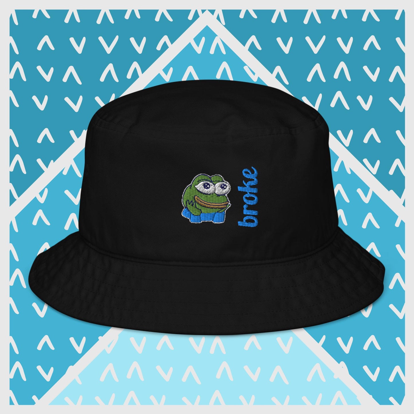 Pepe the Frog bucket hat in green with high-quality embroidery of Pepe wearing blue pants, paired with the word 'broke' in bold blue stitching. Trendy streetwear accessory for meme enthusiasts, perfect for casual outfits and internet culture fans.