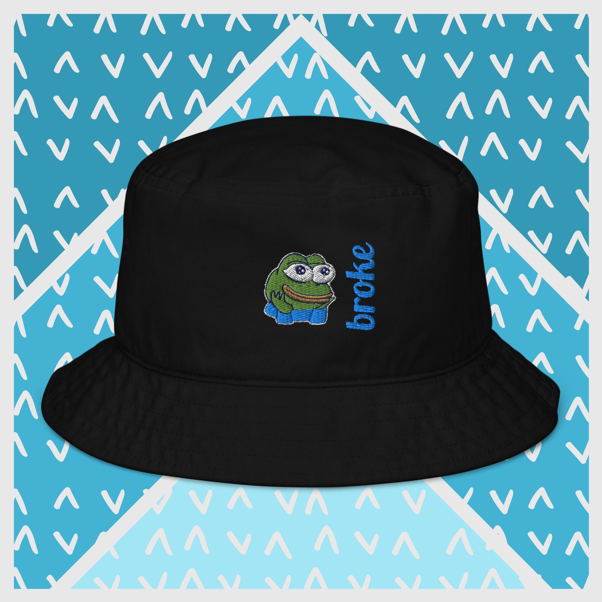 Pepe the Frog bucket hat in green with high-quality embroidery of Pepe wearing blue pants, paired with the word 'broke' in bold blue stitching. Trendy streetwear accessory for meme enthusiasts, perfect for casual outfits and internet culture fans.