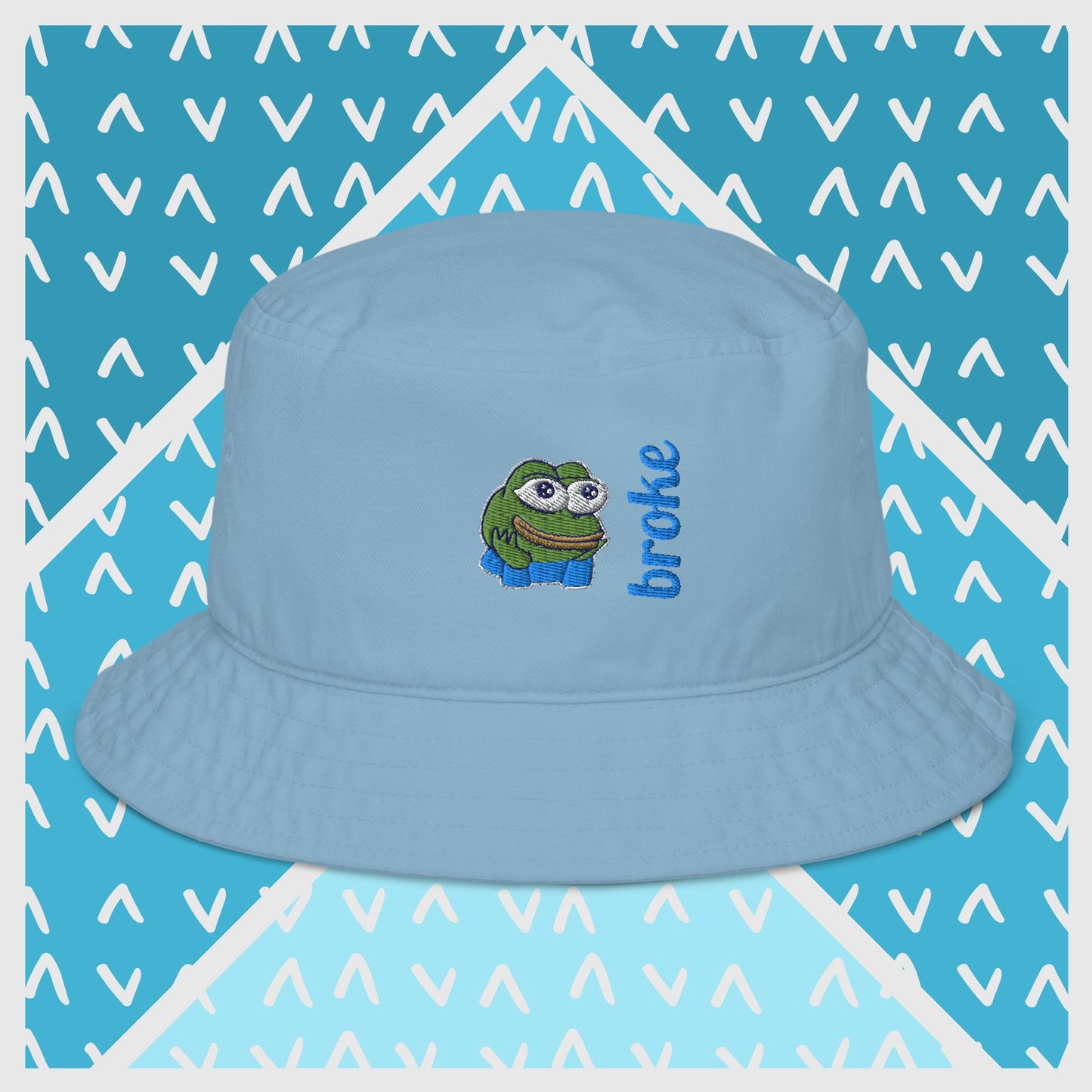 Pepe the Frog bucket hat in green with high-quality embroidery of Pepe wearing blue pants, paired with the word 'broke' in bold blue stitching. Trendy streetwear accessory for meme enthusiasts, perfect for casual outfits and internet culture fans.