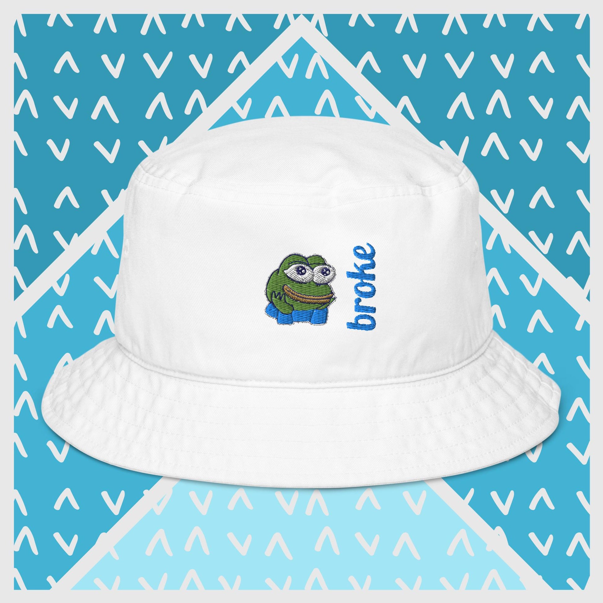 Pepe the Frog bucket hat in green with high-quality embroidery of Pepe wearing blue pants, paired with the word 'broke' in bold blue stitching. Trendy streetwear accessory for meme enthusiasts, perfect for casual outfits and internet culture fans.