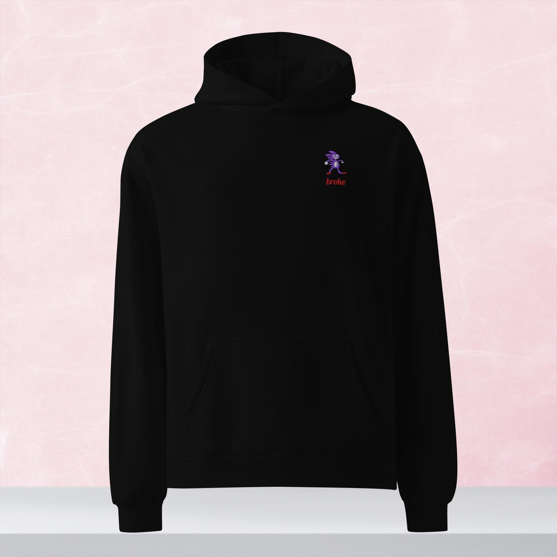 Unisex SANIC embroidered oversized hoodie with high-quality stitching, soft cotton blend, and a relaxed fit. Perfect for meme lovers and streetwear enthusiasts.