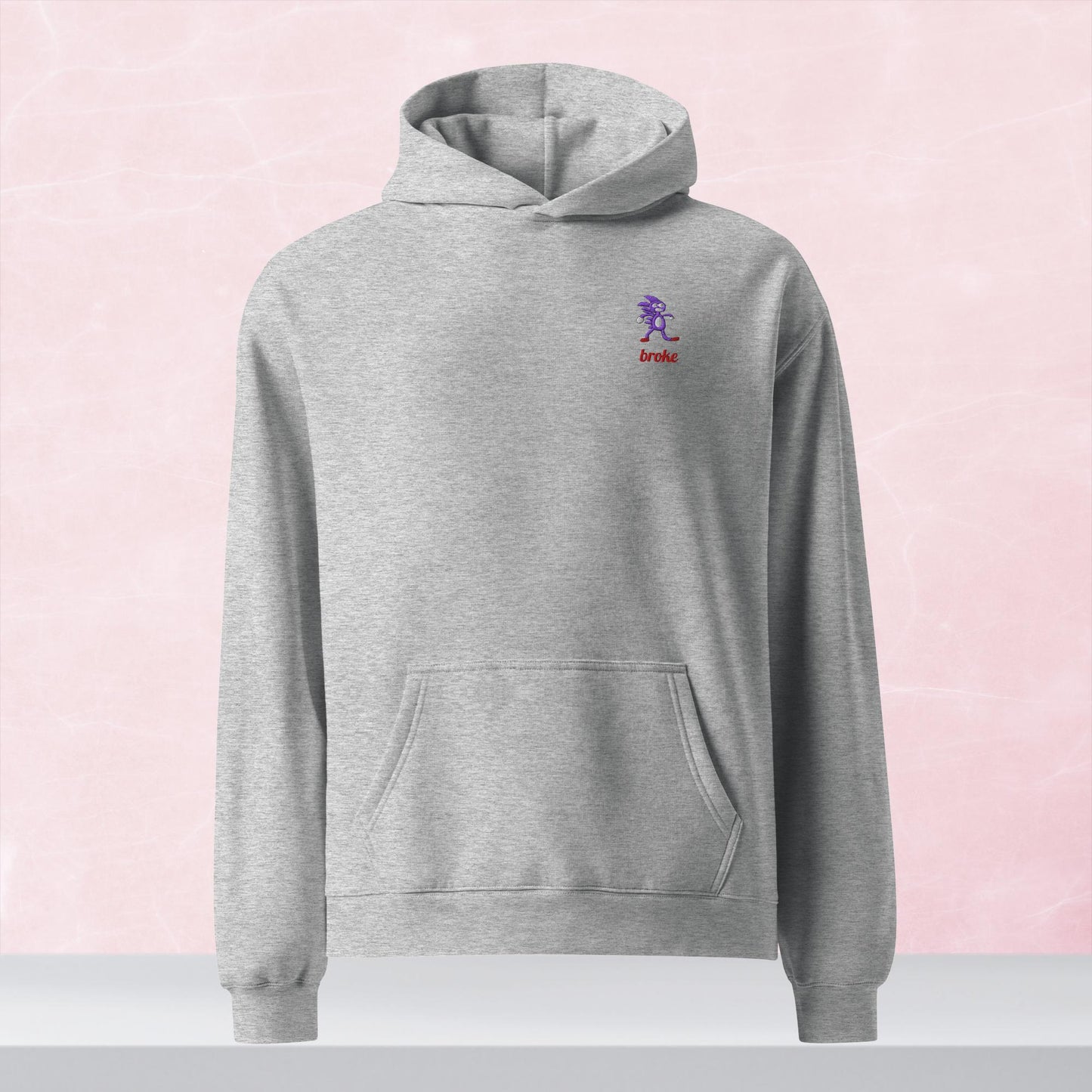 Unisex SANIC embroidered oversized hoodie with high-quality stitching, soft cotton blend, and a relaxed fit. Perfect for meme lovers and streetwear enthusiasts.