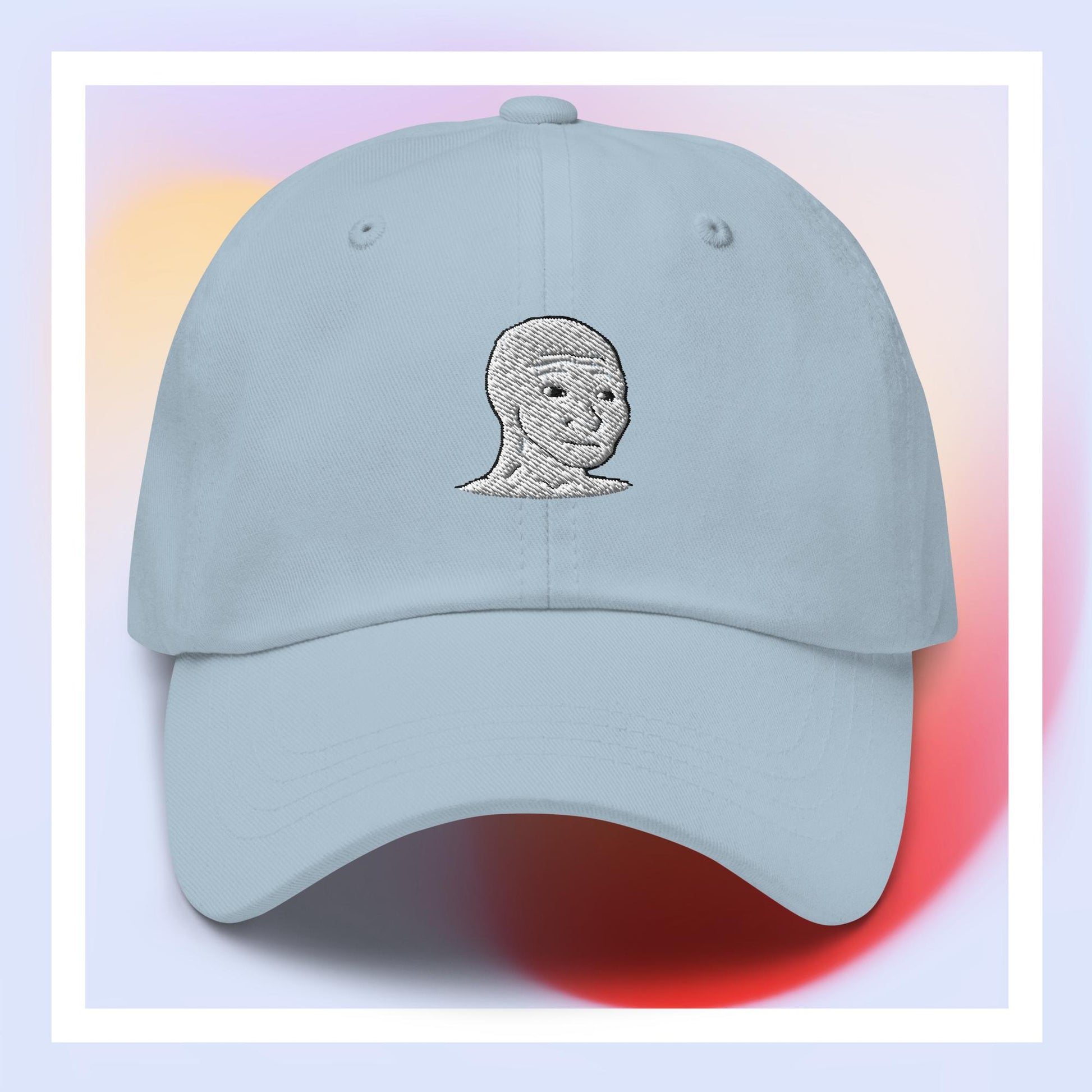 Unisex WOJAK embroidered dad hat with high-quality stitching, adjustable strap, and breathable cotton fabric. Perfect for meme lovers and streetwear enthusiasts.